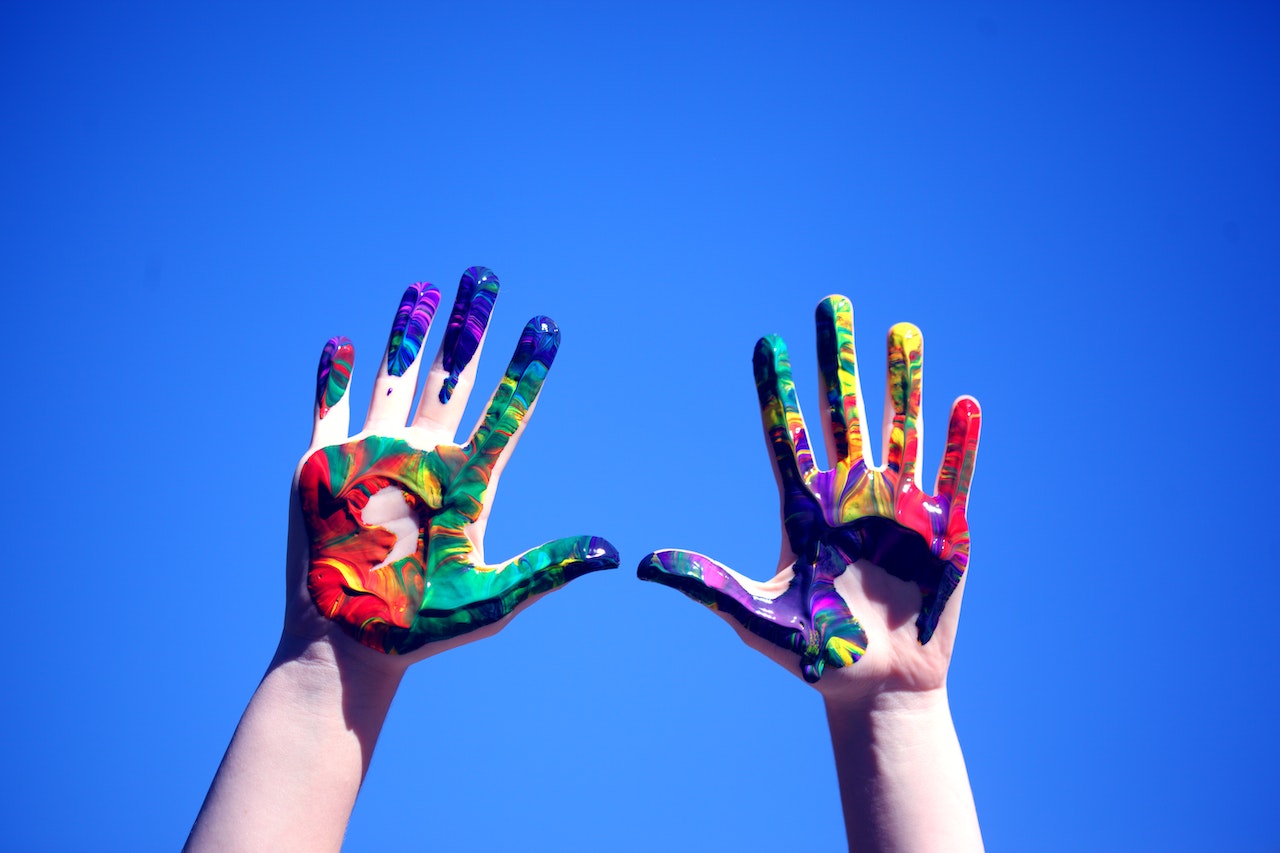 Person's Hands With Paint